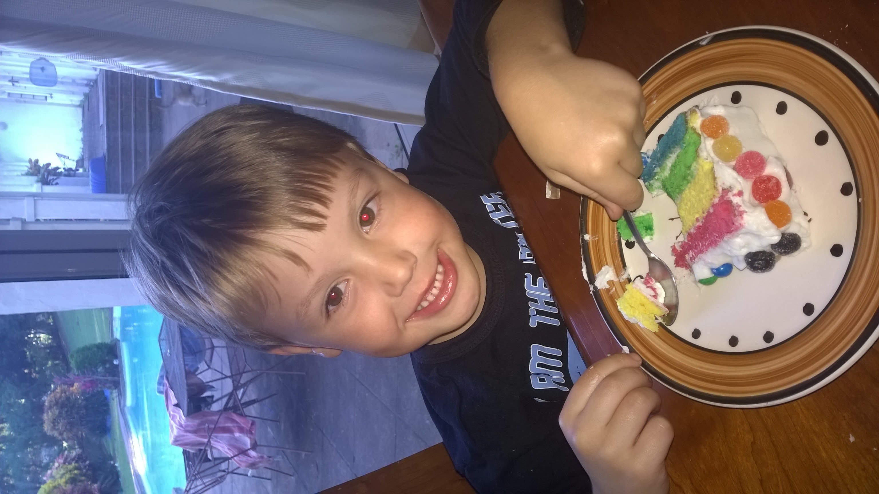 A slice of the rainbow cake